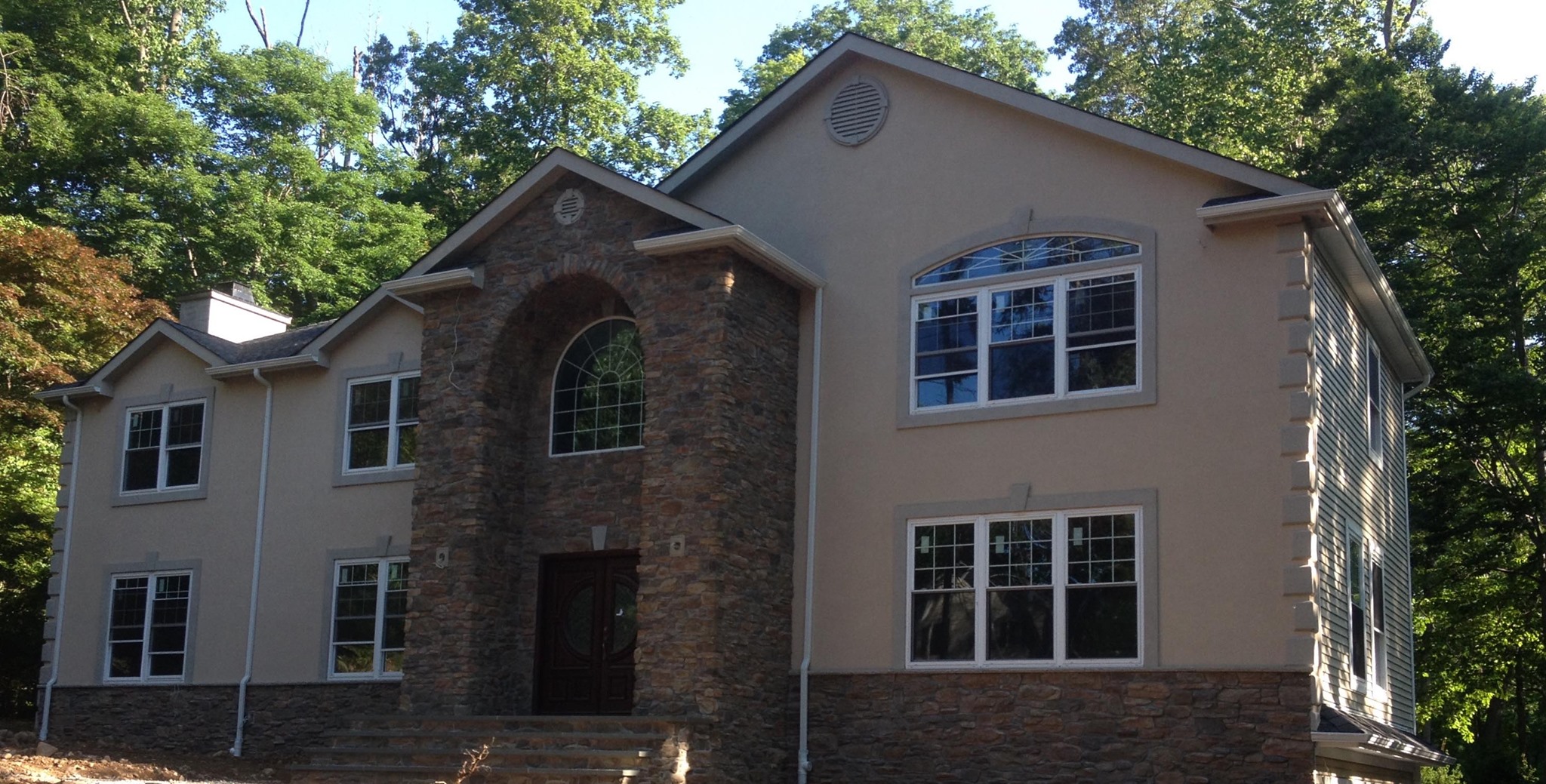 Exterior stone veneer installation in Bergen County NJ by masonry contractor